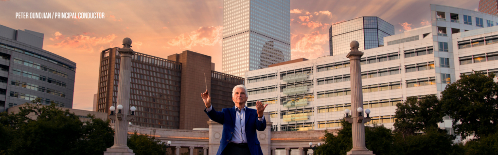 Photo of Peter conducting at the civic center