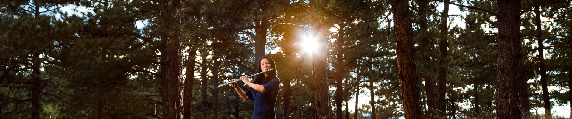 Photo of Catherine Jason Sinn playing the flute